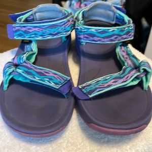 Teva size 4 sandals. Worn very little. Clean, no rips,tears or stains.